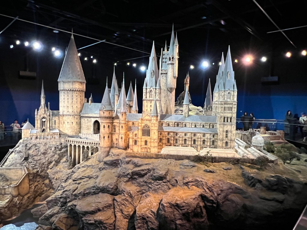 A photo if the model of Hogwarts castle in the daylight scene.