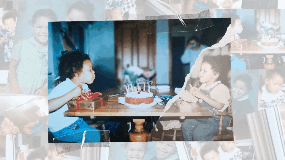 A collage of childhood birthday photos.  

In the main central photo, two small children with medium brown skin and curly dark hair sit facing each other at a wooden table. The child on the left is leaning forward and blowing toward a small round birthday cake with several lit candles. That child wears a light-colored top and blue jeans. The child on the right is smiling, watching, and holding a fork, with a plate of cake in front of them. That child wears a light shirt and blue overalls and sits in a wooden high chair. The table is sturdy with thick turned legs, and the cake is on a white plate with a white cloth or napkin under it. The background shows a doorway and wooden cabinet doors in a home interior.  

This main photo appears slightly torn and taped at the top, with rough white edges on the right side, giving it a scrapbook or nostalgic effect. Faded, semi-transparent photos are layered behind it, showing more images of the same children at different moments: smiling close-ups, another angle of the birthday cake, and casual candid shots. The overall color tone is warm and slightly faded, evoking older printed family photographs.